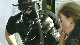 German Babe Double Penetrated in Fetish Threesome