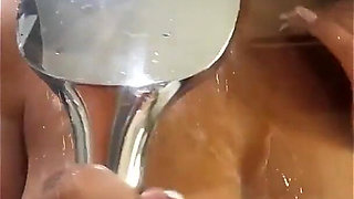 Busty Tattooed MILF Tyra Drenches Herself with Shower Head