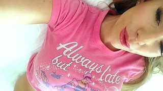 A super sexy brunette massages her big boobs