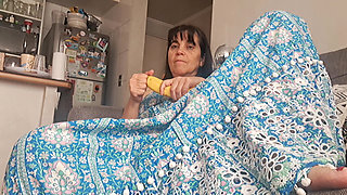 Stepmom in Armchair Touching Her Pussy
