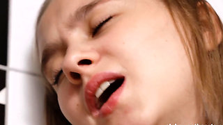 Hot blonde with natural breasts rubbing herself in the shower