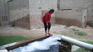 Desi Indian girl bathing in pool, village girl taking bath