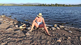 Pussy masturbation near the river