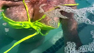 Artemisia Love flashing her juicy big tits underwater for you wearing a sexy bikini
