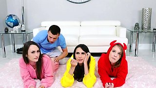 Three girlfriends spicing up pajama party with a cock