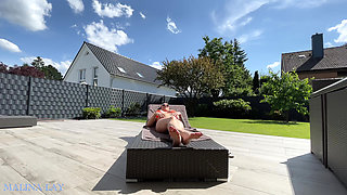 Hot milf pampers her sexy body on the terrace and oils herself