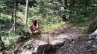 MILF Woman with Big Tits Jerking Fat Dick in the Woods