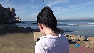 Beautiful brunette Imani Valor in hot glasses having sex on the beach.