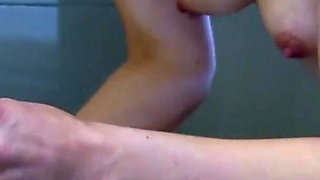 The horny skinny teen lesbians have sex in the bathtub