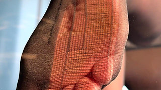 Watch Me Tease You with My Ripped Nylon Feet Through the Glass