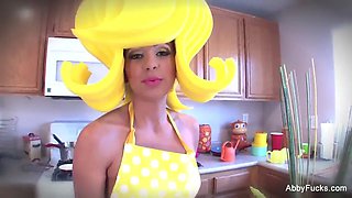 Cartoon style Abigail Mac getting off in the kitchen