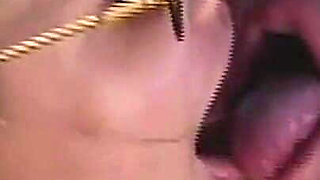 She Lies Naked on the Beach While He Watches Her