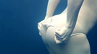 Taking off My Bikini in the Pool