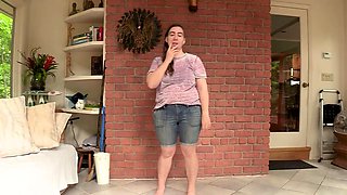 Brunette spreads cheeks for rimming and toy fun