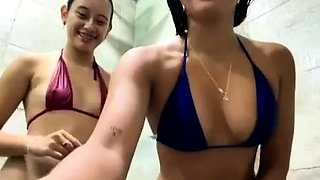 Two teens taking a shower taking a shower 857128009632007489