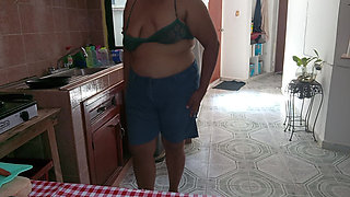 Mom in the kitchen in bralett