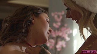 Chloe Temple and Leana Lovings engage with festive holiday playthings.