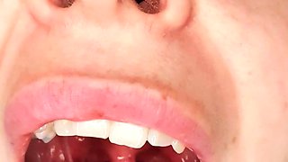 Ebony brunette masturbates with dildo in close up