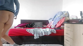 Amateur wife has fun trying on clothes that she cuts herself. Amateur wife dances naked around the house.