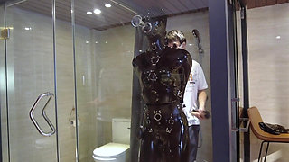 Mz20 - the Girl in Latex Clothing Locked in a Glass Room