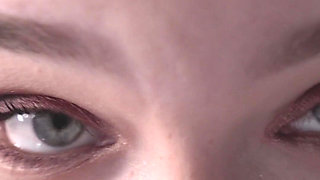 A Girl Is Messing with a Macro Camera