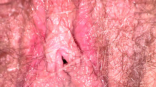 Creamy juices dripping in slowmotion from inside wife's hairy bush closeup
