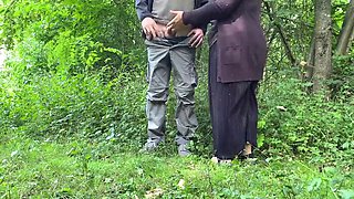 Fingering my mother in laws ass while she jerks off my cock in the park