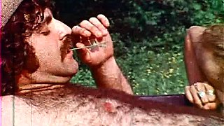 Brunette gives mass blowjob outdoors