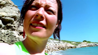 brunett babe taken to the beach to fuck