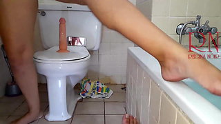 Pussy play with dildo. Seat on dildo at public toilet
