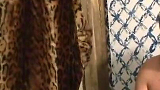 The blond woman humiliates and spanks on the masked guy