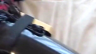 Mz15 - a Puppy Wearing a Latex Suit and Bound by a Red Rope.