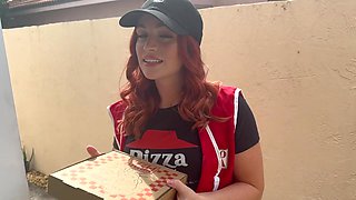 Fiery Redhead Ignites Passion with Untamed Energy