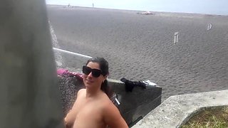 A Curvy Girl Gets Completely Changed And Takes Naked A Shower Outdoors On The Beach