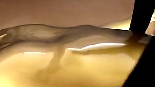 Latex Lovers Encased in Gold