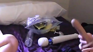 Horny blonde fucks her brunette lesbian girl with a strap-on