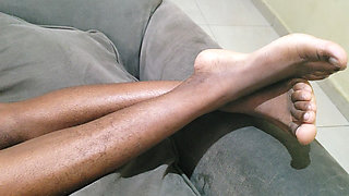 A Woman with Lots of Beautiful Pubic Hair Between Her Legs Lies on Her Sofa Waiting to Be Made Love to Her