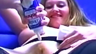 Blonde Babe Stuffs Mature Brunette with Dripping Dildo Action