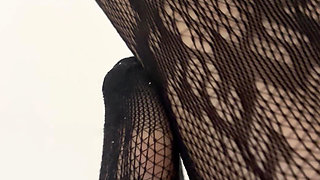 Rubbing my legs and feet in sexy black stocking