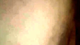 Busty curly brunette with big boobs fucks on couch