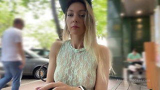 Anastasia Ocean gets off with daring public masturbation in a bustling café, wearing a see-through top and no panties