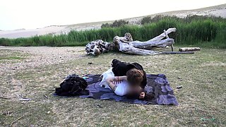 Young couple fucks on the beach until it gets dark.