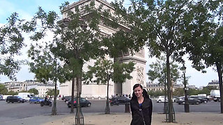 Vanessa , a pretty brunette, shows off on the Champs Elysees