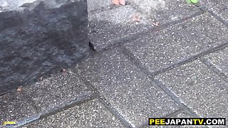 Asian students urinating in public