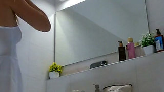 Beautiful Yoga Teacher Hot Blonde in a Half Transparent Mini Dress Goes Full Naked in the Bathroom