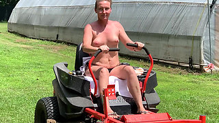 Titties out Riding lawnmower outdoors
