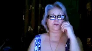 Russian granny ex-teacher shows off her big tits on webcam