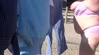 Trisha hanging out the washing