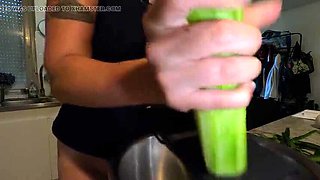 Hot French MILF Kahann masturbates with cucumber in kitchen close-up amateur video