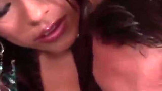 Stunning brunette babe is pleasuring two hard dicks